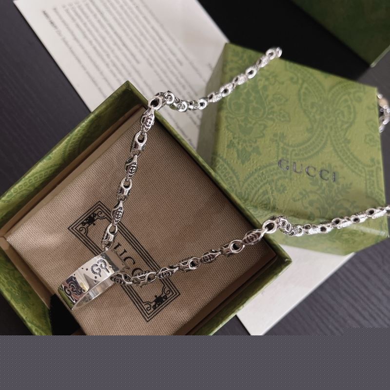G*u*i necklaces
